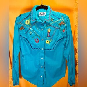 Amazing blue southwestern shirt with embroidered ranch and western motifs